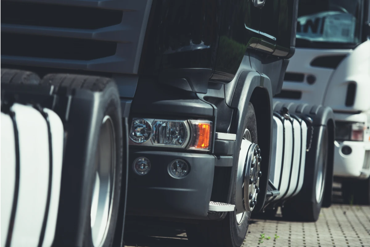 Close-up of commercial HGV lorries parked together in a fleet