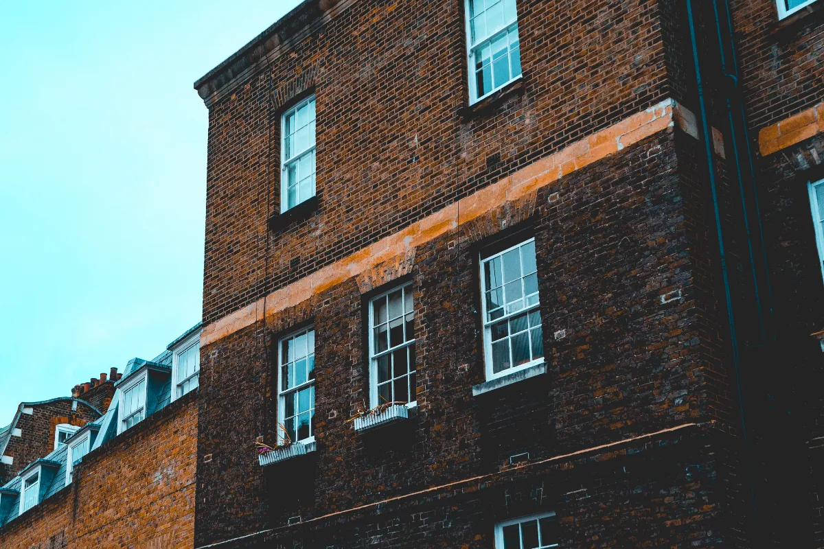 Traditional red brick residential buildings with white sash windows